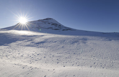 Iceland, Mountain, snow and sun - RAEF01780