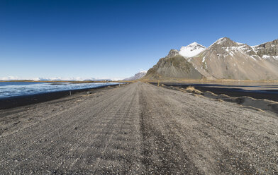 Iceland, Dirt road in Vestrahorn and Stokksnes peninsula - RAEF01783