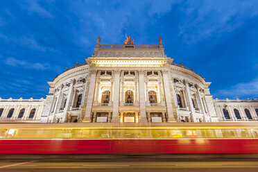 Austria, Vienna, Burgtheater, ring road, tram at night - WDF03946