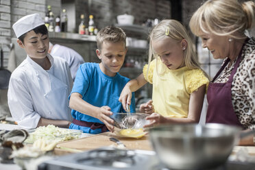 Kids cooking in cooking class - ZEF13531