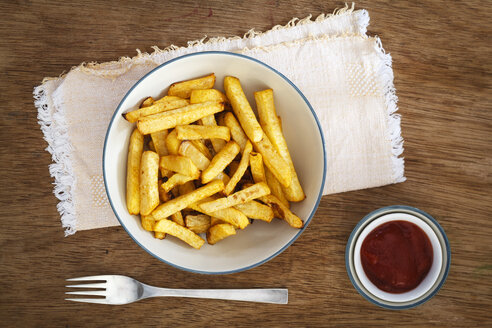Bowl of swede fries and bowl of ketchup - EVGF03194
