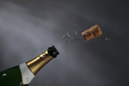 Champagne cork manikin in the air - NIF00080