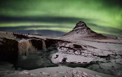 Iceland, frozen Kirkjufell and northen lights - RAEF01803