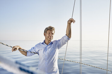 Portrait of mature man on his sailing boat - PDF01162