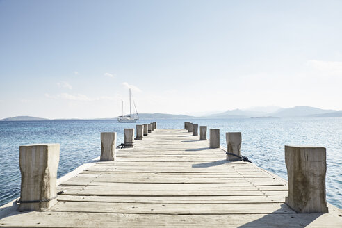 Empty jetty and saling boat in the background - PDF01210