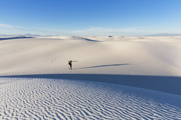 USA, New Mexico, Chihuahua Desert, White Sands National Monument, photographer on dune - FOF09209