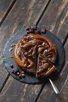 Sliced chocolate cake on slate plate - CSF28243