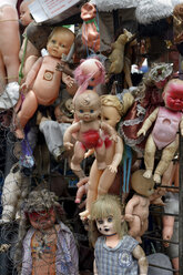 Columbia, Bogota, Used dolls on the gate of a waste collector - FLKF00800