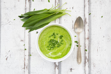 Bowl of ramson soup garnished with chives and cream - LVF06047