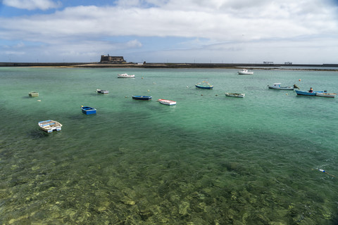 Spain, Lanzarote, Arrecife, fishing harbour and the Castle of San Gabriel stock photo