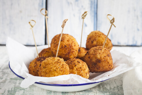 Arancini with skewers on a plate - SBDF03185