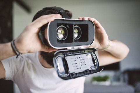 Man wearing virtual reality glasses stock photo