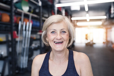 Portrait of happy senior woman in gym - HAPF01449