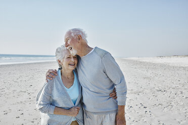Happy senior couple on the beach - RORF00776