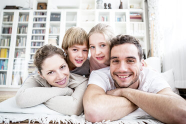 Portrait of happy family at home - WESTF23040