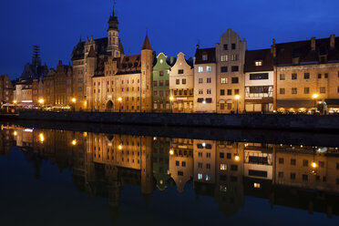 Poland, Gdansk, skyline at Motlawa bank with river reflection - ABOF00181