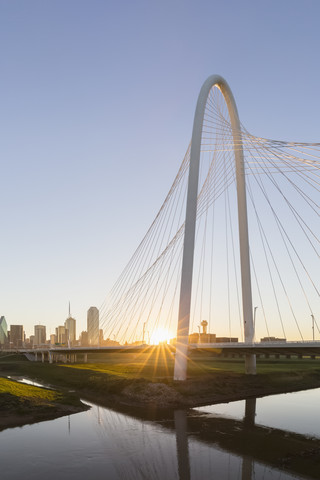 USA, Texas, Dallas, Margaret Hunt Hill Bridge and skyline at sunrise stock photo