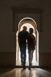 Morocco, Marrakesh, couple leaving building - KKAF00768