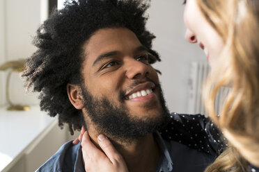 Close up of man smiling at woman - SBOF00434