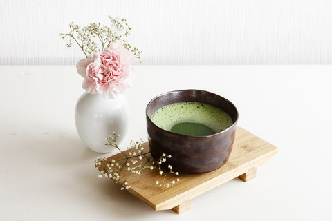 Bowl of matcha tea stock photo