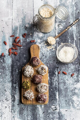 Various Bliss Balls on wooden board - SARF03329