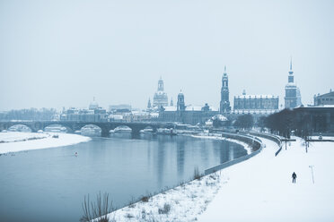 Germany, Dresden, view to the city with Dresden Frauenkirche and Elbe river in winter - ASCF00738