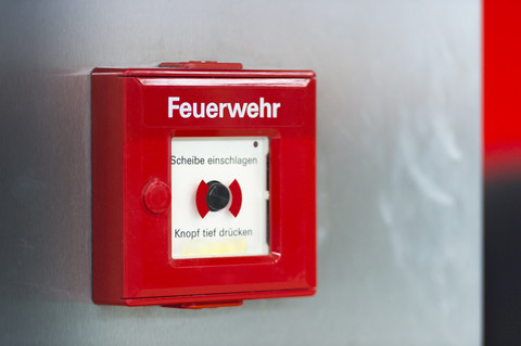 Feueralarm an der Wand, lizenzfreies Stockfoto