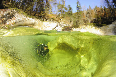 Austria, Upper Austria, Lake Attersee, Weissenbach, river diving - GNF01390