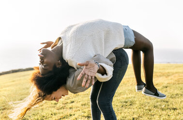 Two best friends having fun outdoors - MGOF03369