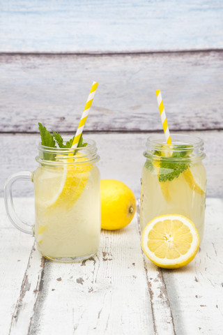 Two glasses of cooled lemonade flavoured with lemon balm stock photo
