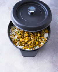 Roasting dish of prepared lamb meat with rice, raisins and pistachios - PPXF00042