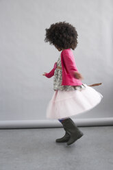 Fashionable girl dancing - FSF00873