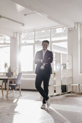 Portrait of confident businessman in office - KNSF01329