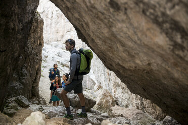 Italy, Friends climbing rocks in the Dolomites - ZOCF00475