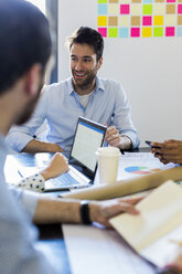 Business people having a meeting in office - GIOF02609