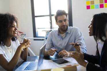 Business people having a meeting in office - GIOF02618