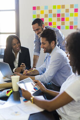 Business people having a meeting in office - GIOF02632