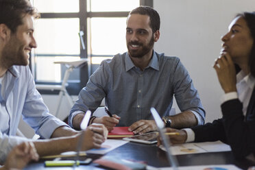 Business people having a meeting in office - GIOF02649