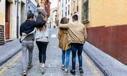 Two couples strolling in the city - MGOF03398