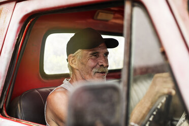 Senior man driving an old pick up - ZEF13876