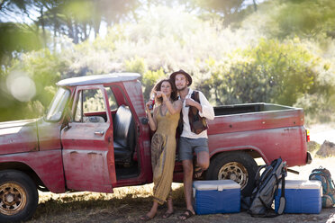 Young couple at old pick up truck - ZEF13891