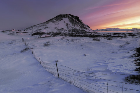 Iceland, Snowy landscape at sunset stock photo