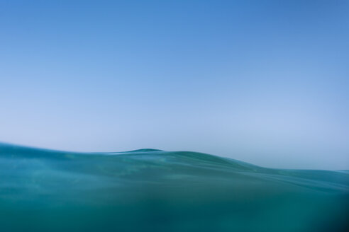 Water surface against clear blue sky - BZF00366