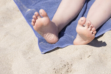 Feet of woman with writing 'Here Now' at the toes - CMF00685