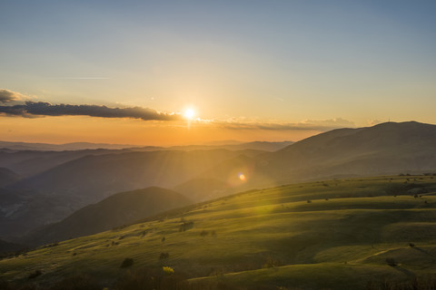 Italy, Marche, Petrano Mountain, sunset over Apennine Mountains stock photo