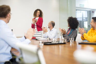 Business people applauding during a meeting in boardroom - ZEF13999