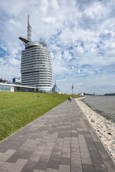 Germany, Bremerhaven, waterfront promenade with Atlantic Hotel Sail City - ELF01841