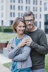 Portrait of happy mature couple outdoors - RORF00924