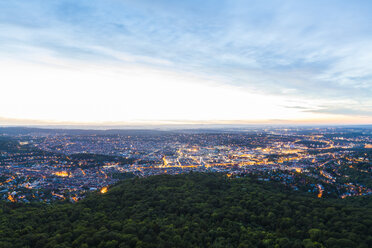 Germany, lighted cityscape of Stuttgart at twilight - WDF04040