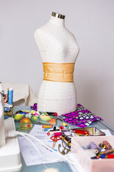 Fashion designer's working table with mannequin and equipment - MGIF00050